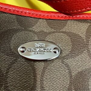 Coach large tote brown logo and red/orange trim